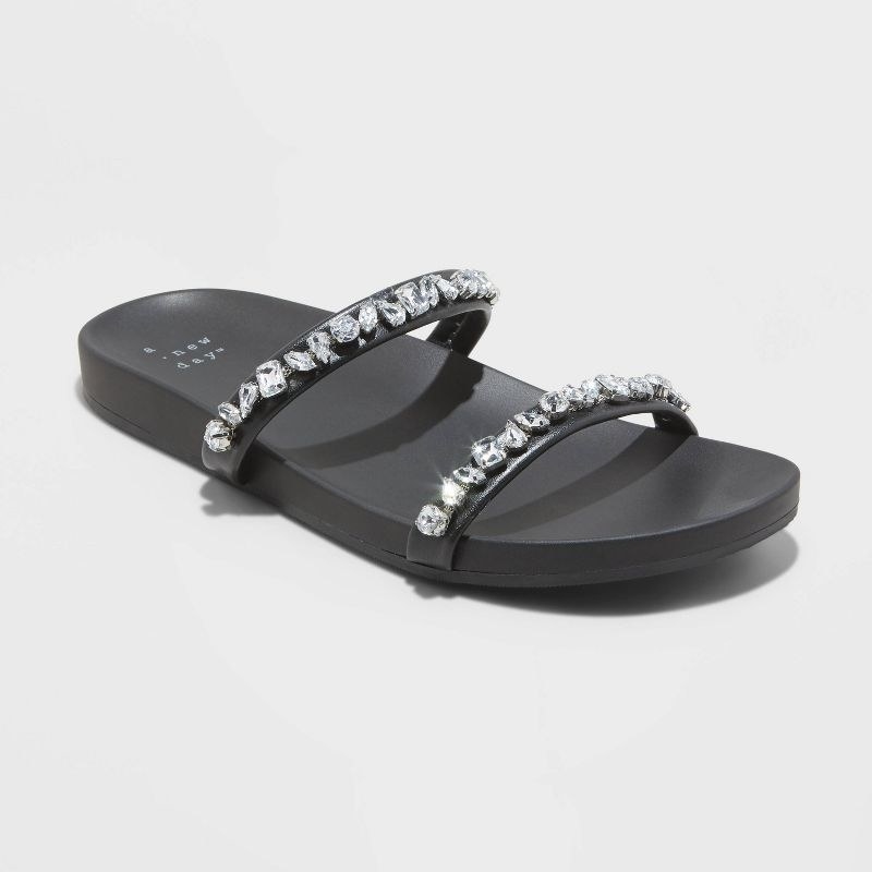 A black sandal with silver gemstones