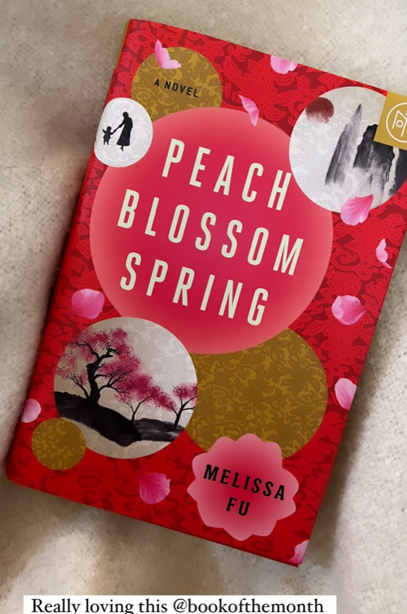 &quot;Peach Blossom Spring&quot; by Melissa Fu on a blanket.