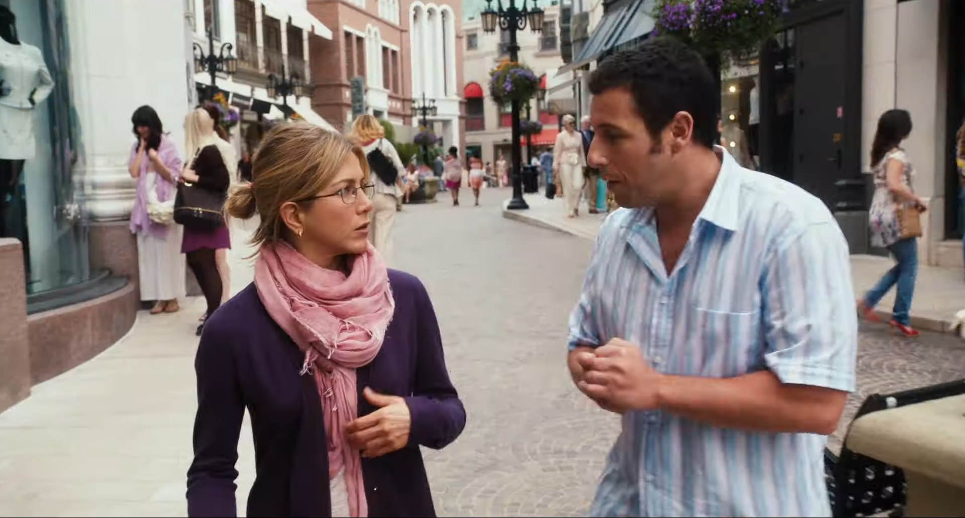 Jennifer Aniston and Adam Sandler&#x27;s characters are walking down the street