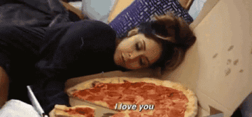 Snooki hugging a pizza and saying, &quot;I love you&quot;