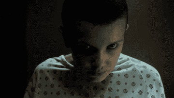 GIF of Eleven twitching her head to telekinetically kill a man