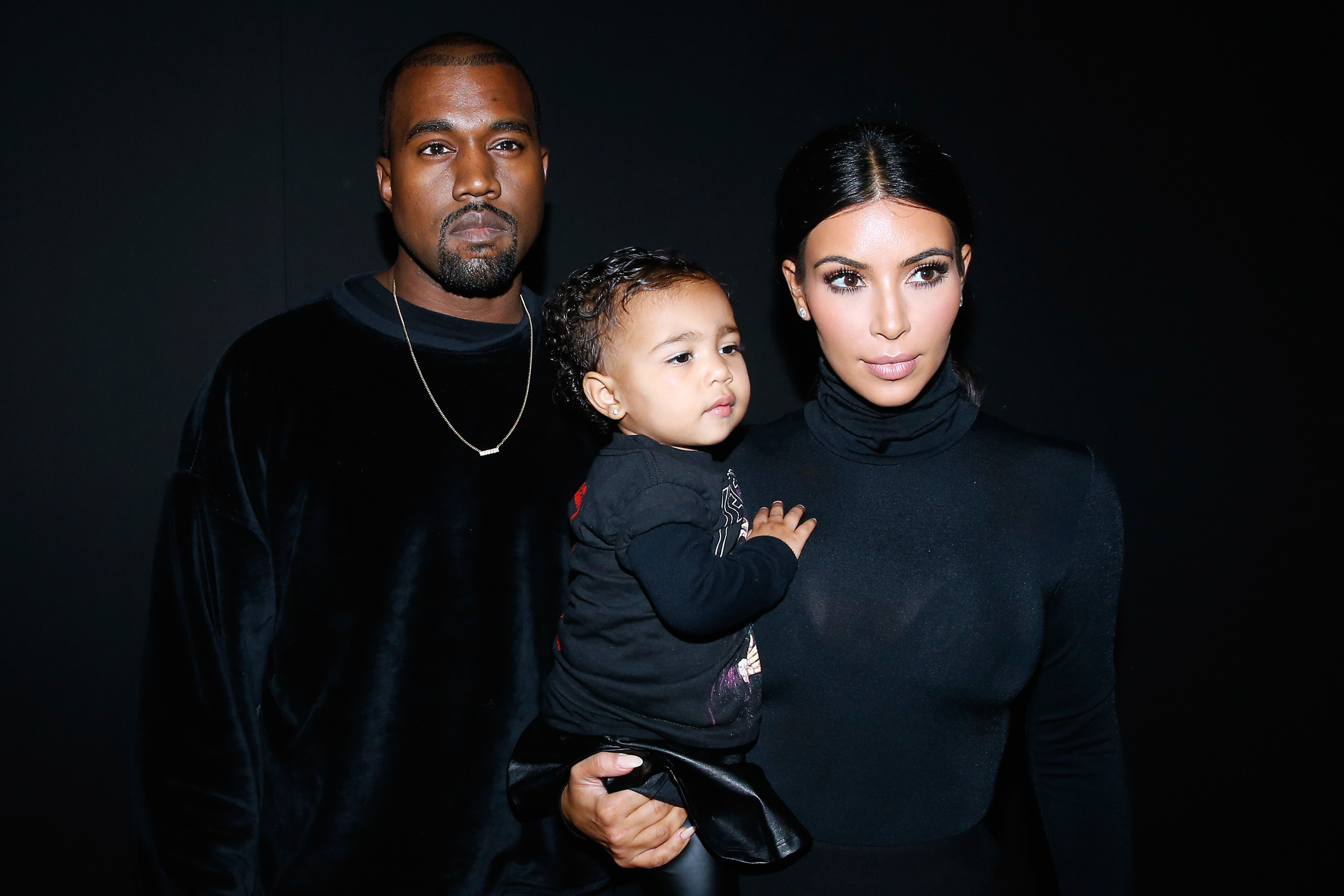 North West Is Kanye West's Style Twin in His Vintage Varsity Jacket