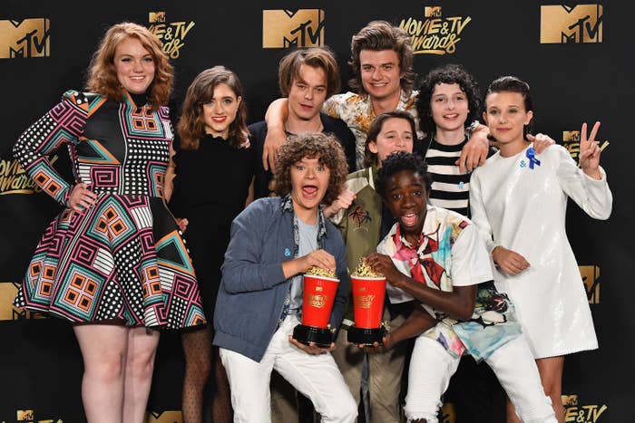 The cast of season 1 holding MTV awards