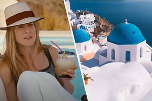 Carrie is on the left holding a drink with a view of Greece on the right