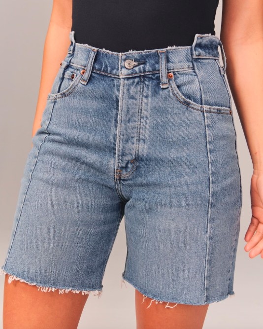 model wearing denim jeans