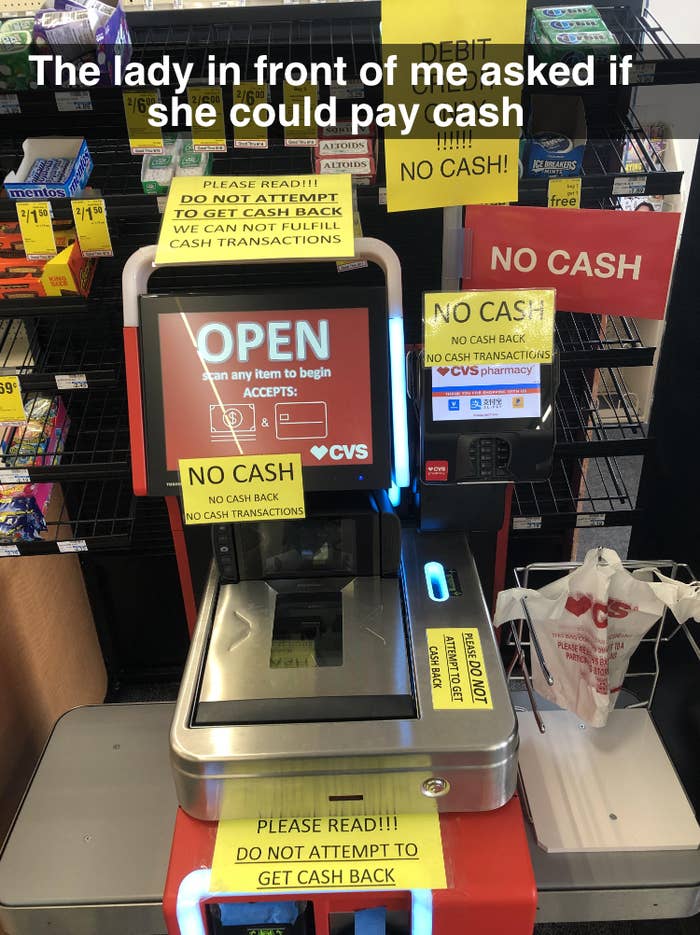 machine with many cash only signs on it that customers ignore