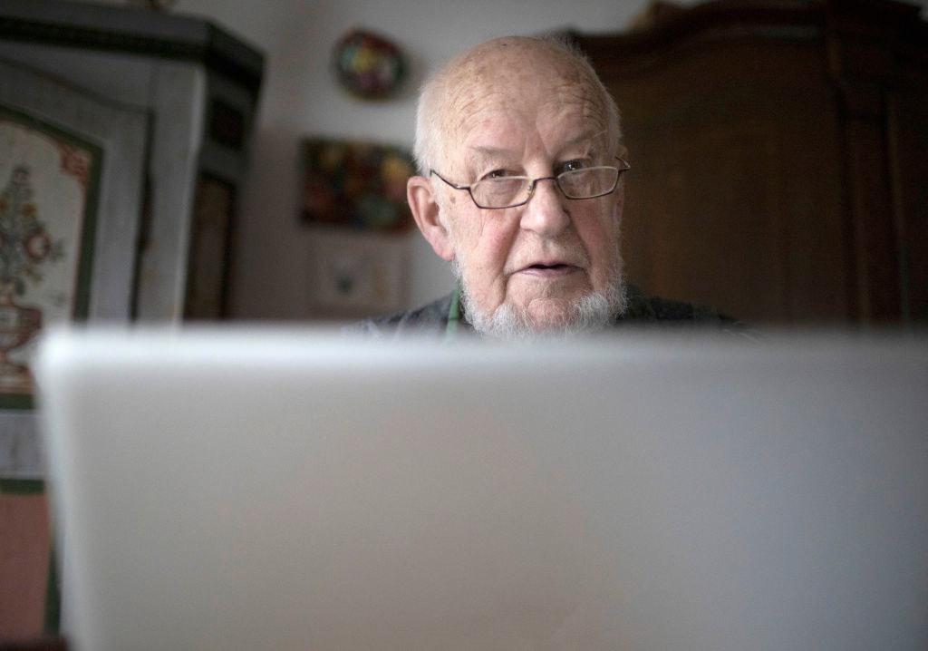 a man at a laptop