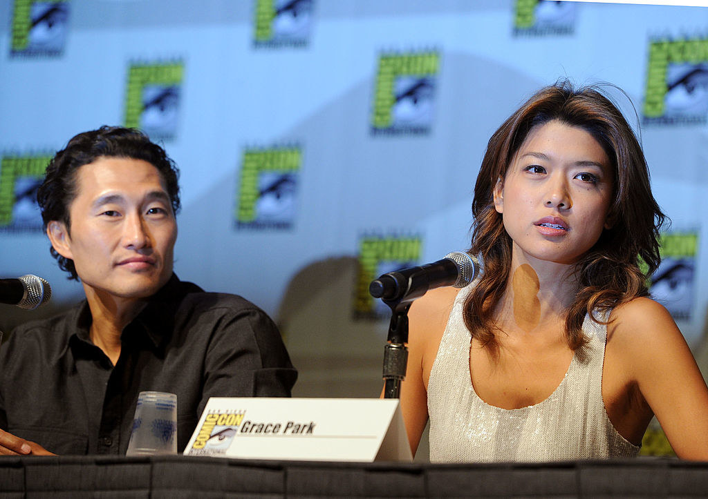 the two at a comic-con table