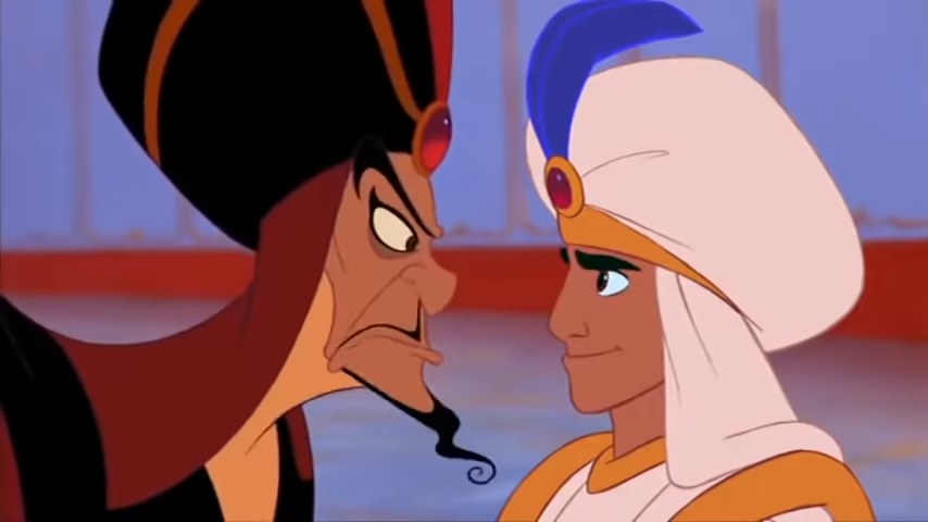 Jafaar glaring at a smiling Aladdin in &quot;Aladdin&quot; (1992)