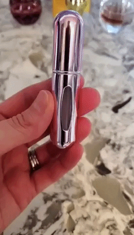 a model demonstrates how to use the atomizer