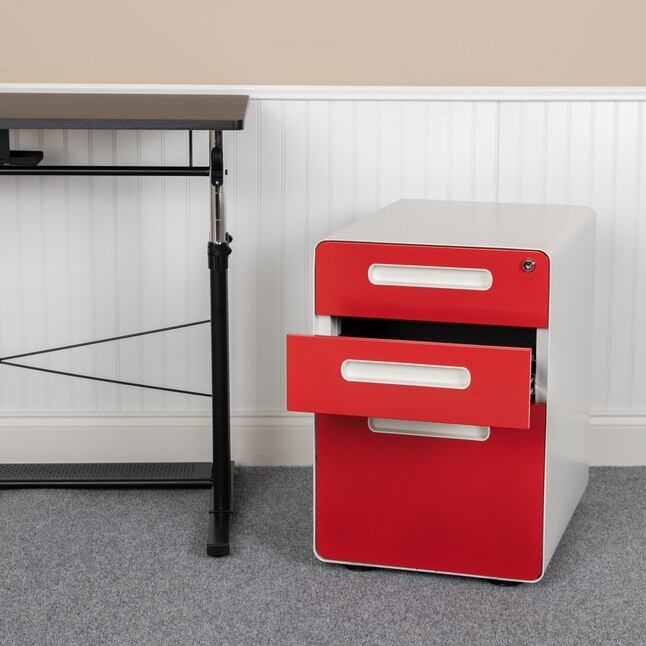 a red and white three-drawer file cabinet