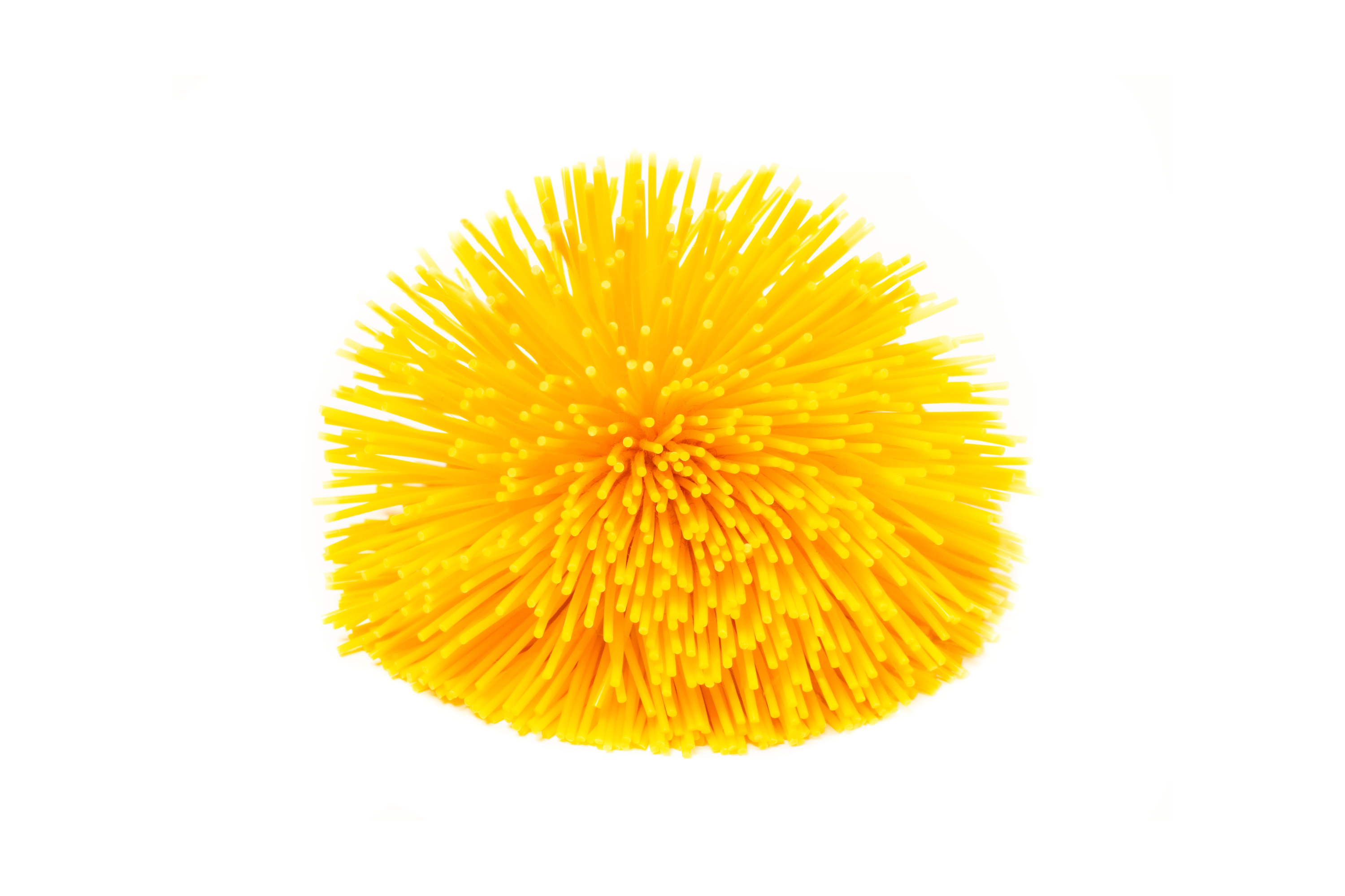 A yellow koosh ball
