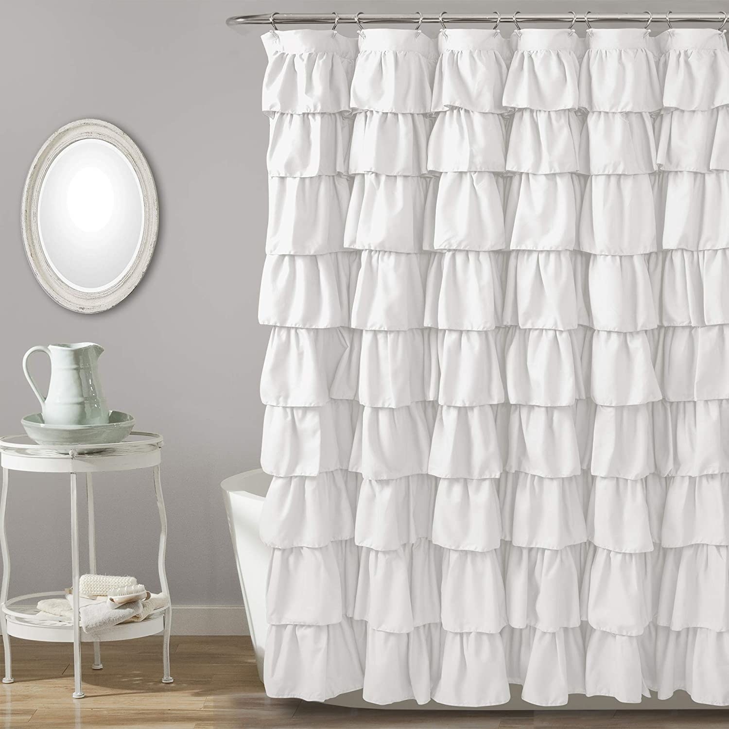 The white ruffled shower curtain