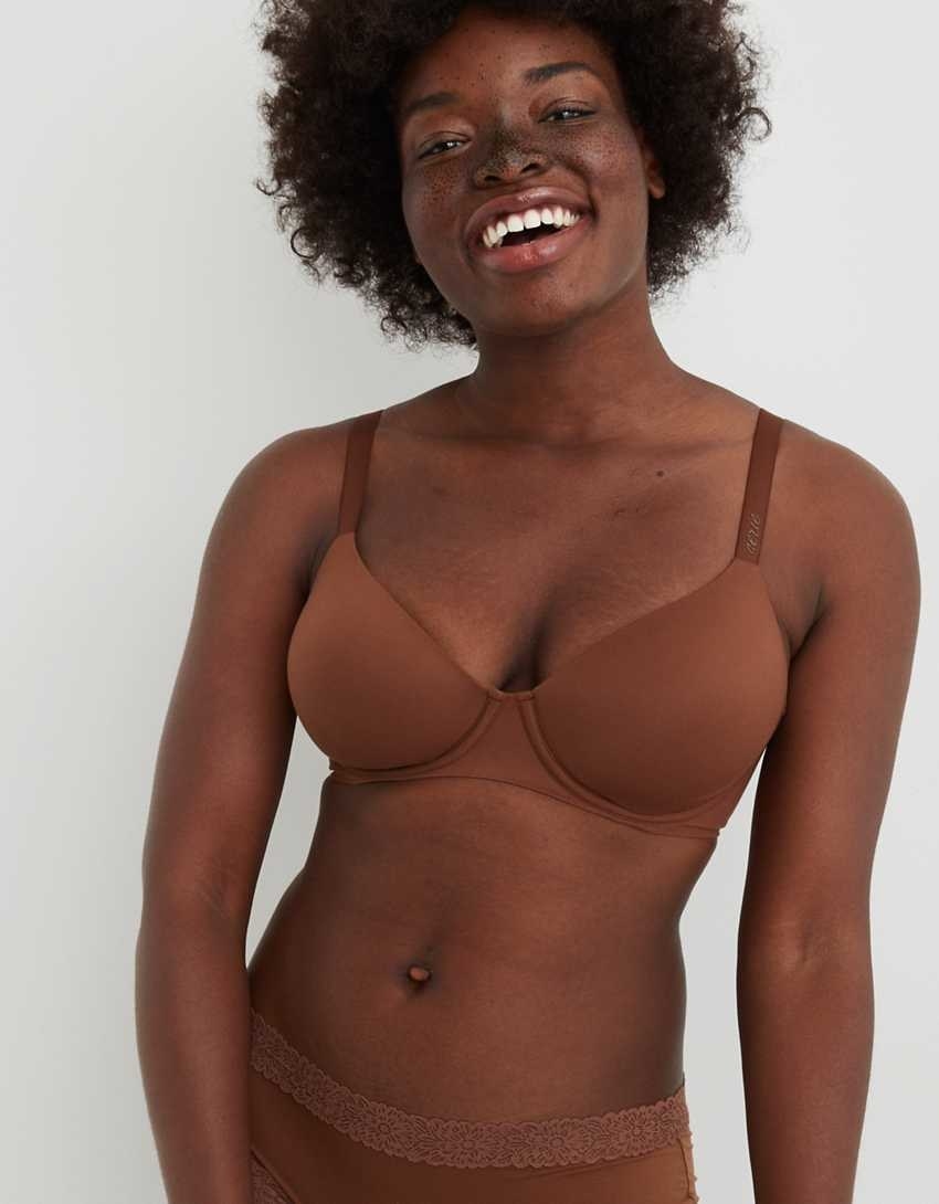 model in a dark brown underwire bra