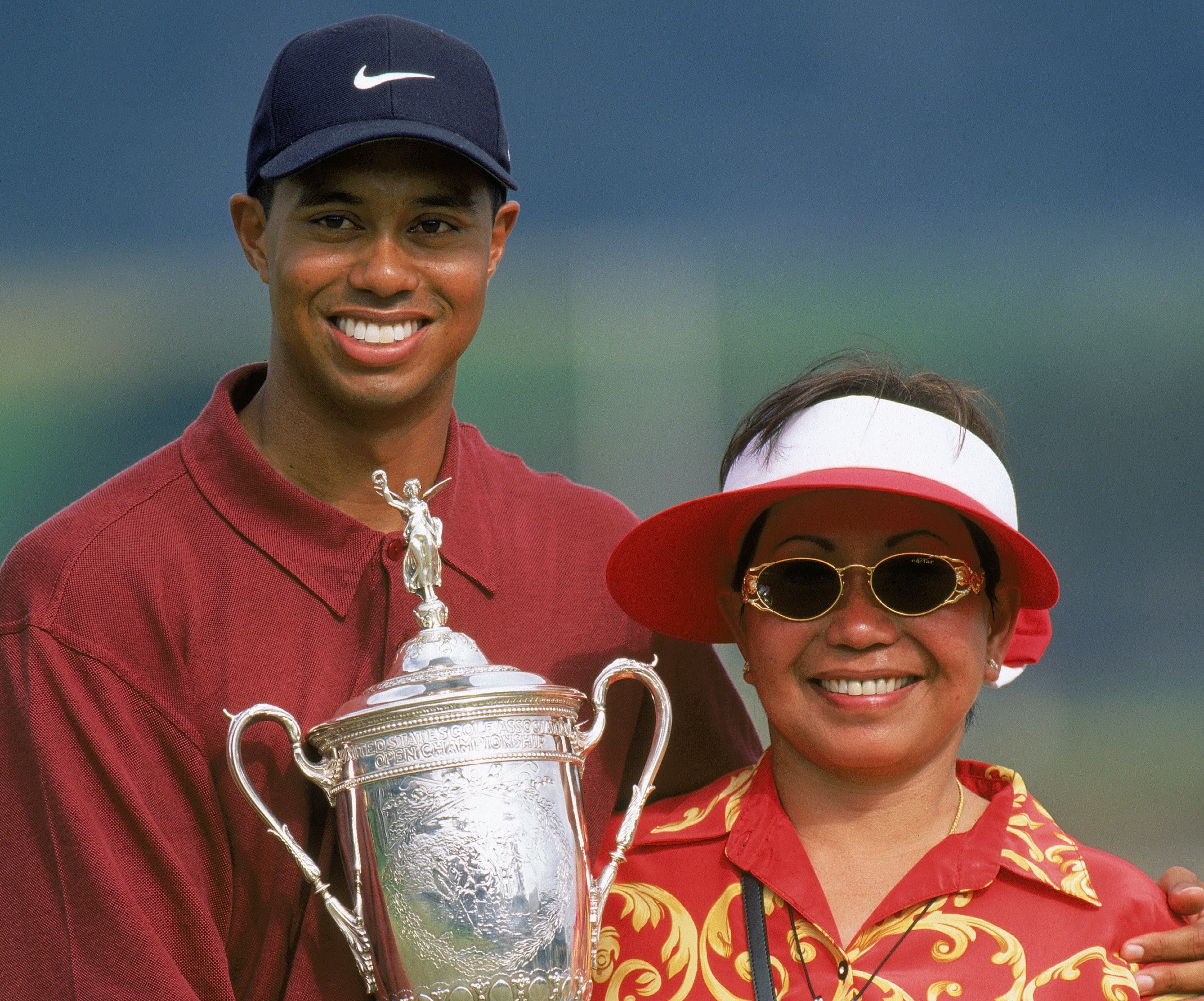 Tiger Woods holds US Open trophy and poses with his mom