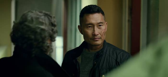 Ben Daimio with Professor Bruttenholm&#x27;s back turned next to him in &quot;Hellboy&quot; (2019)