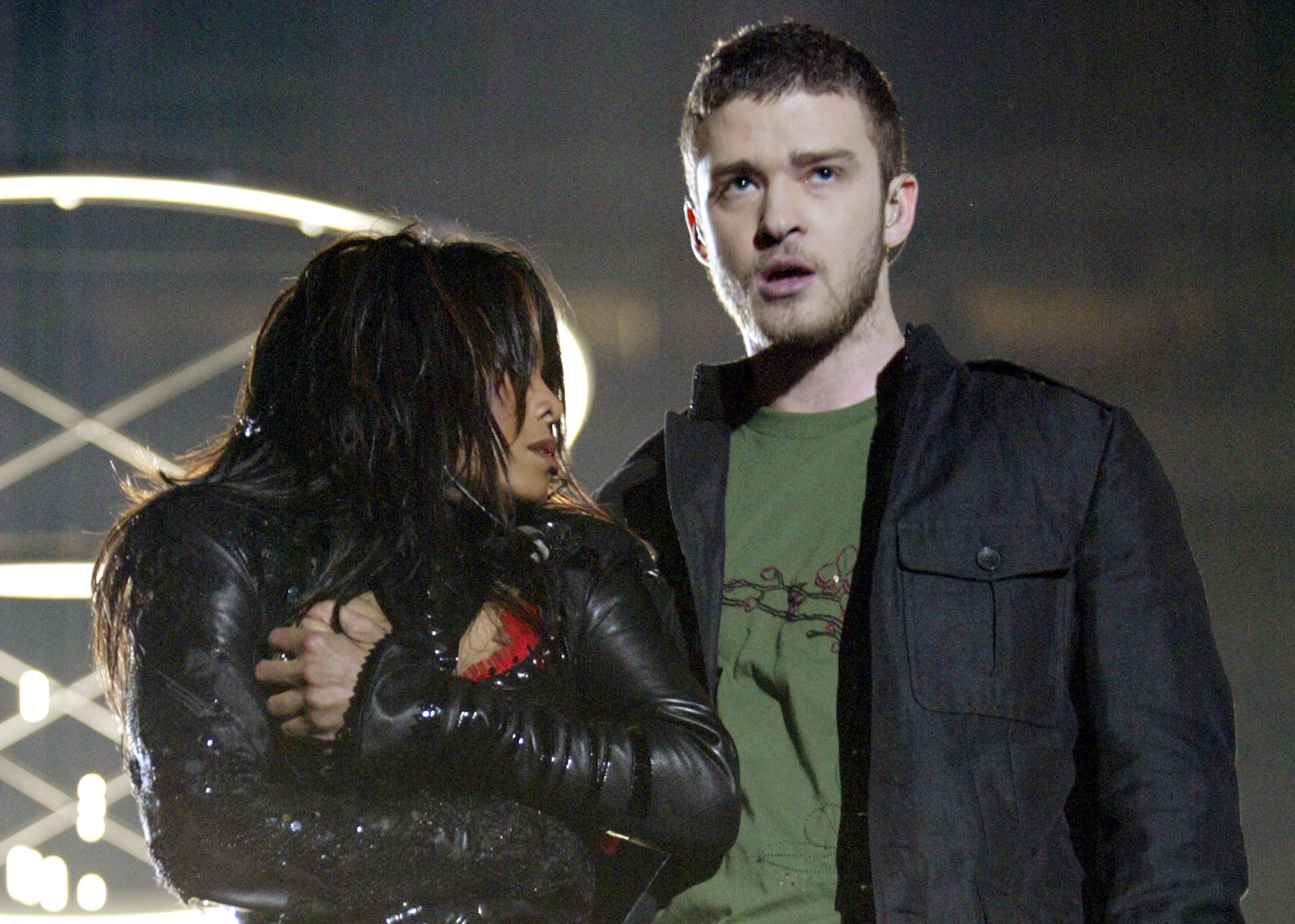 Janet Jackson angrily looks up at a dumbfounded Justin Timberlake