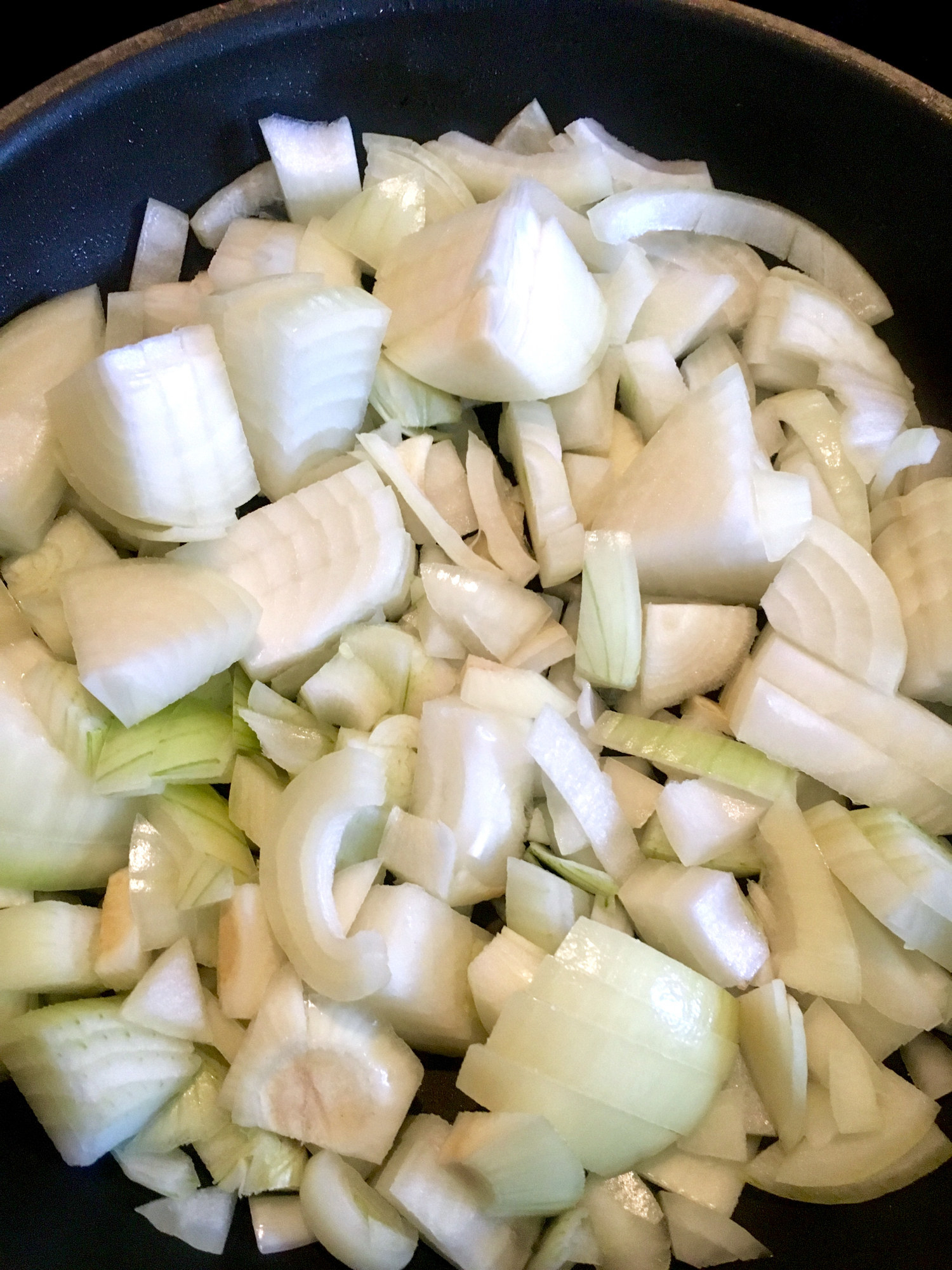 Chopped onion in a skillet.