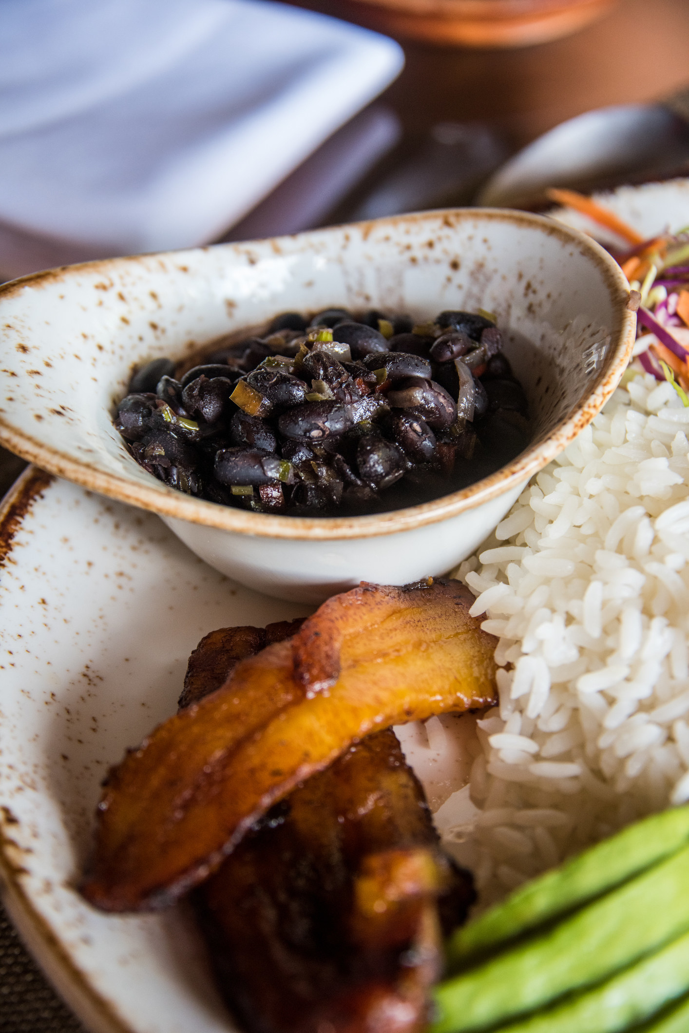 Latin American food with a side of black beans.