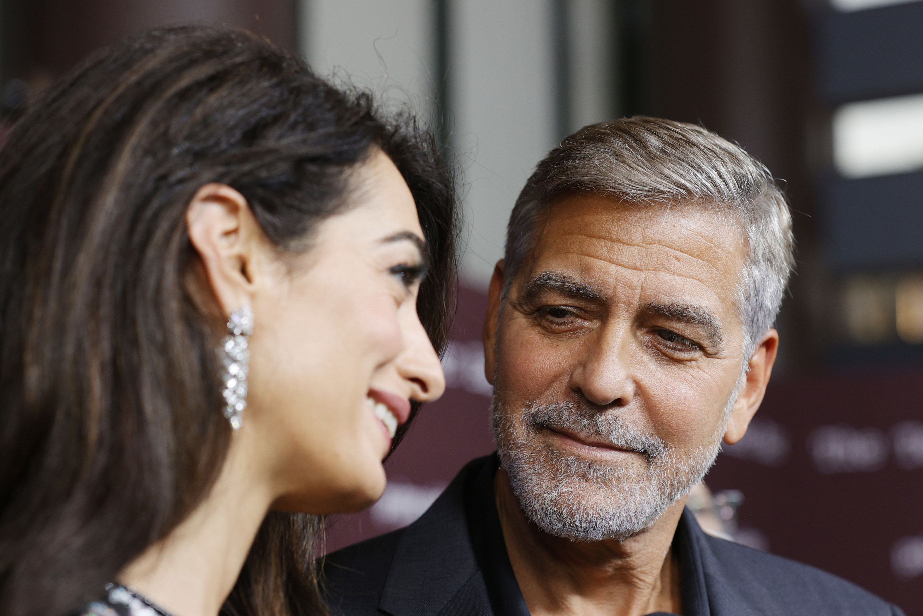 Amal Clooney and George Clooney are pictured at the &quot;Tender Bar&quot; premiere on October 03, 2021