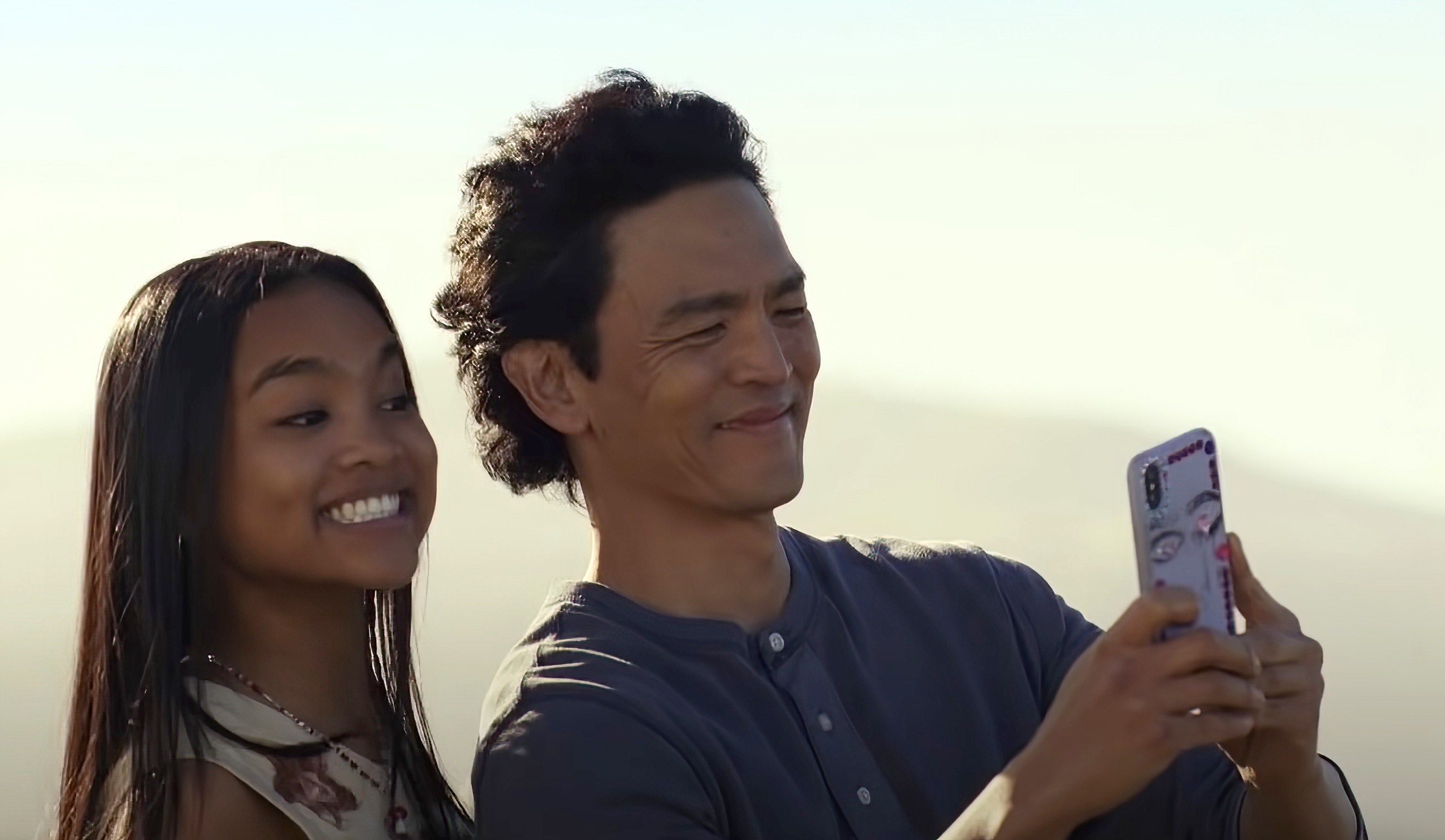 Mia Issac and John Cho take a selfie