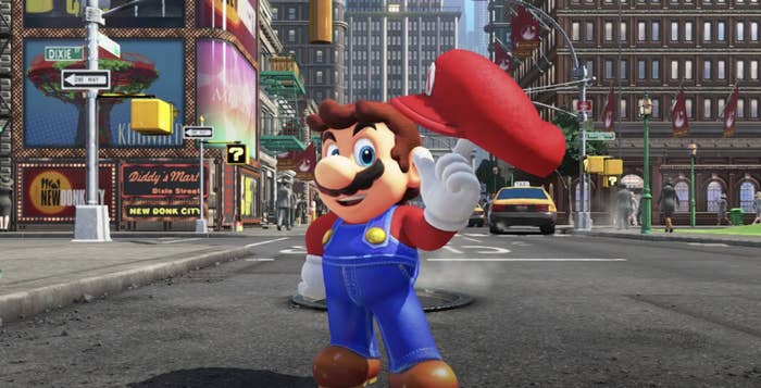 Mario twirls his cap while standing in a city