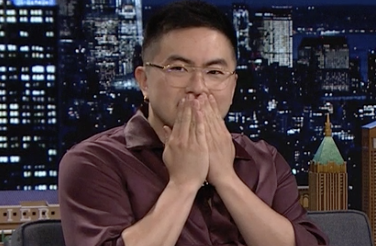 Bowen Yang covering his mouth