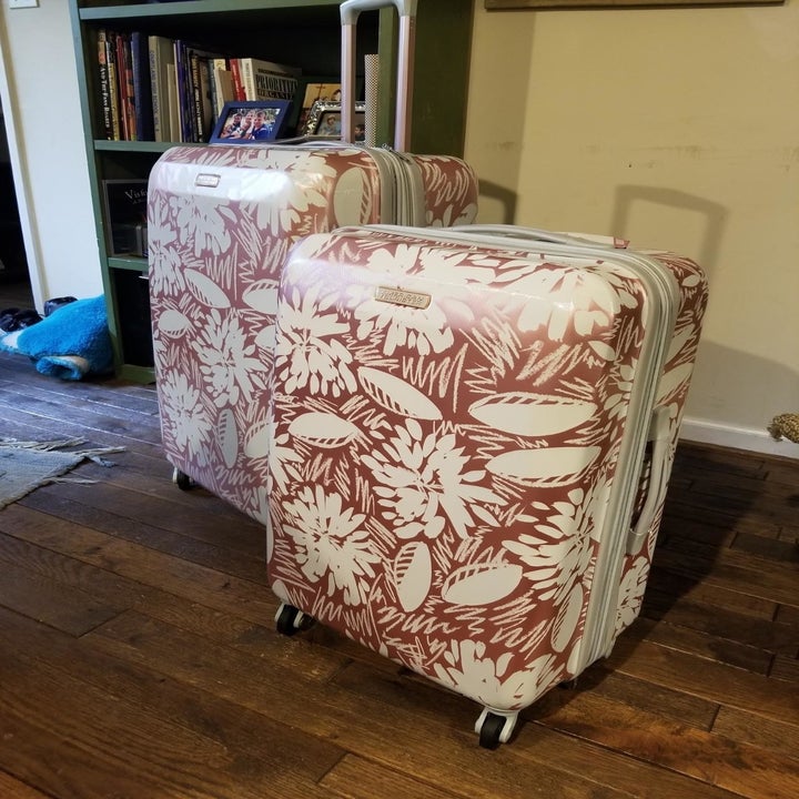 Reviewer image patterned suitcases