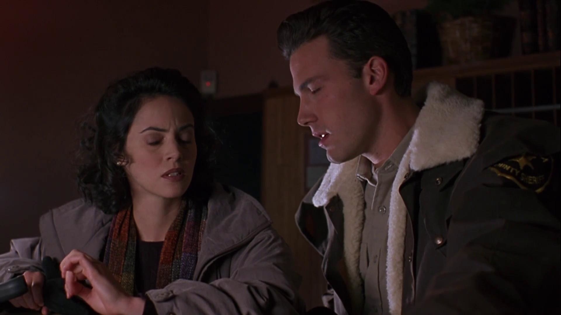 Ben Affleck as Sheriff Bryce Hammond and Rose McGowan as Lisa Pailey in &quot;Phantoms&quot;
