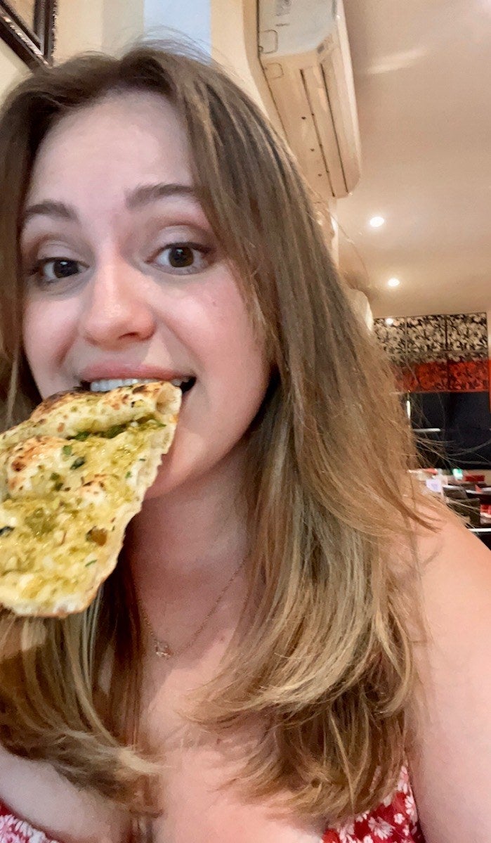 author eating naan