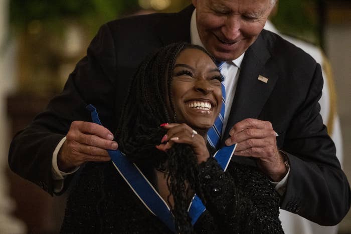 President Biden giving Simone Biles the Medal of Freedom