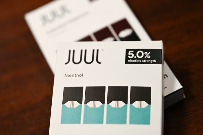 Menthol flavored Juul e-cigarette products are displayed in a convenience store. 