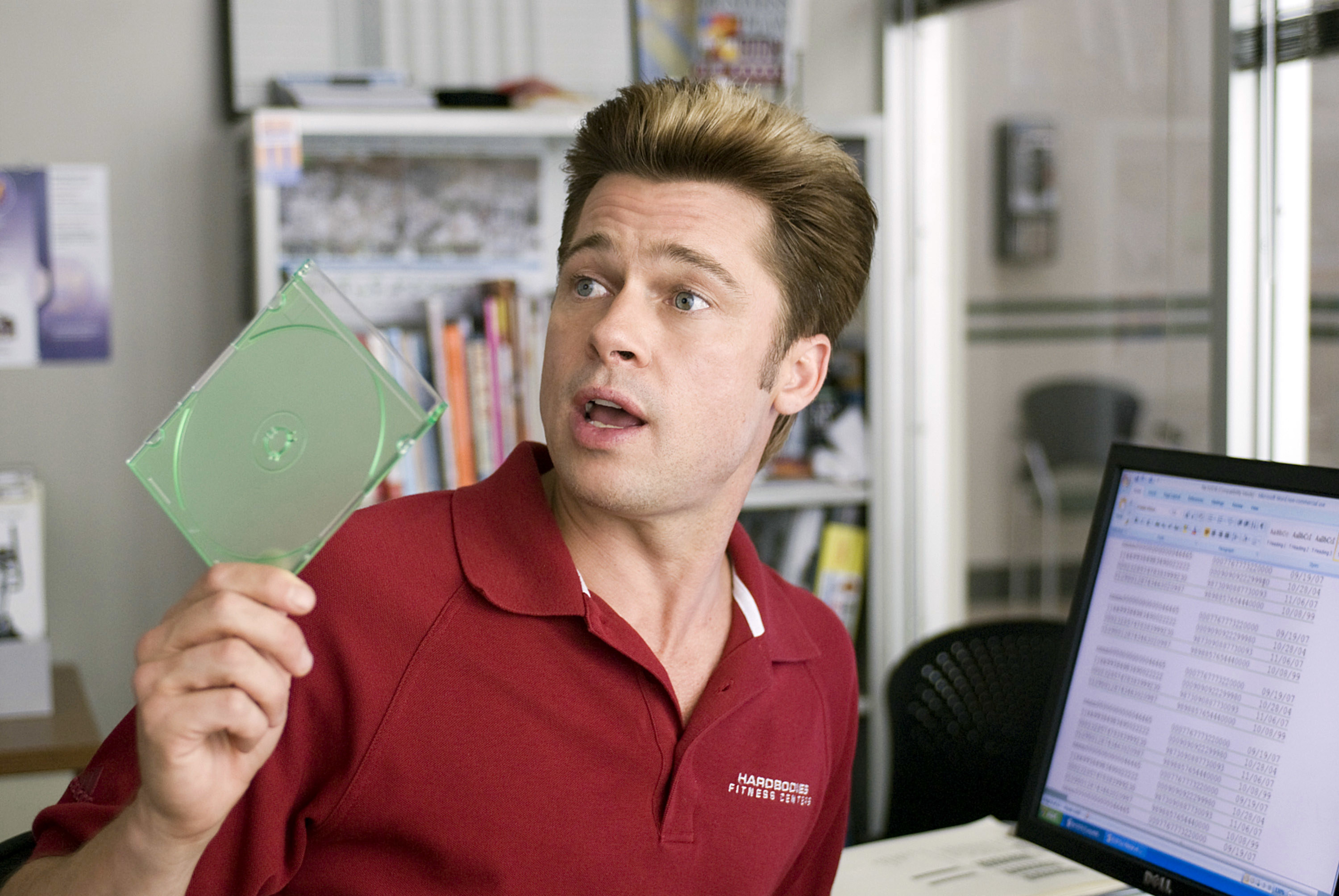 Brad Pitt holding up a CD case
