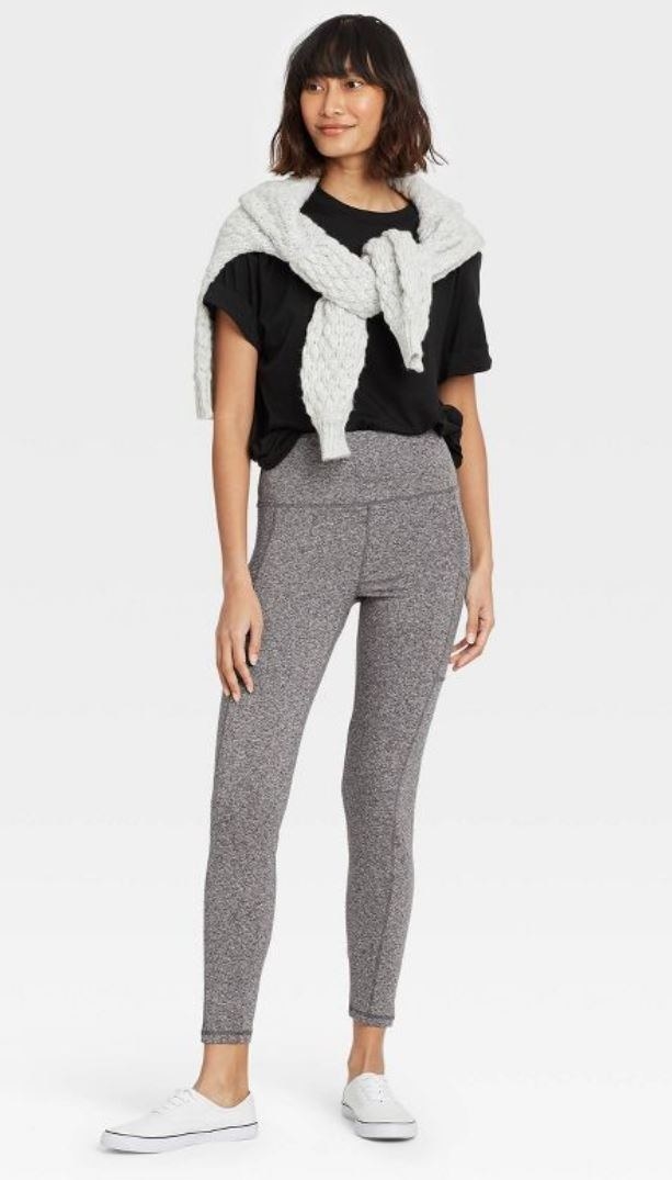 model wearing gray speckled high waisted leggings