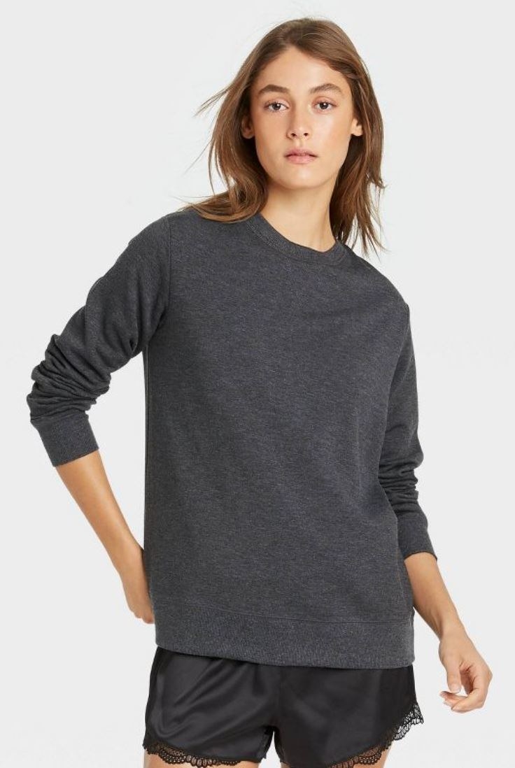 model wearing charcoal gray fleece pullover