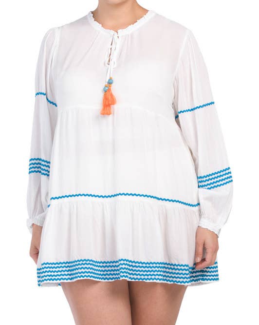 tiered design, rickrack trim, peasant sleeve, keyhole front with tie closure, tassel details, bead accents, ruffle trim
