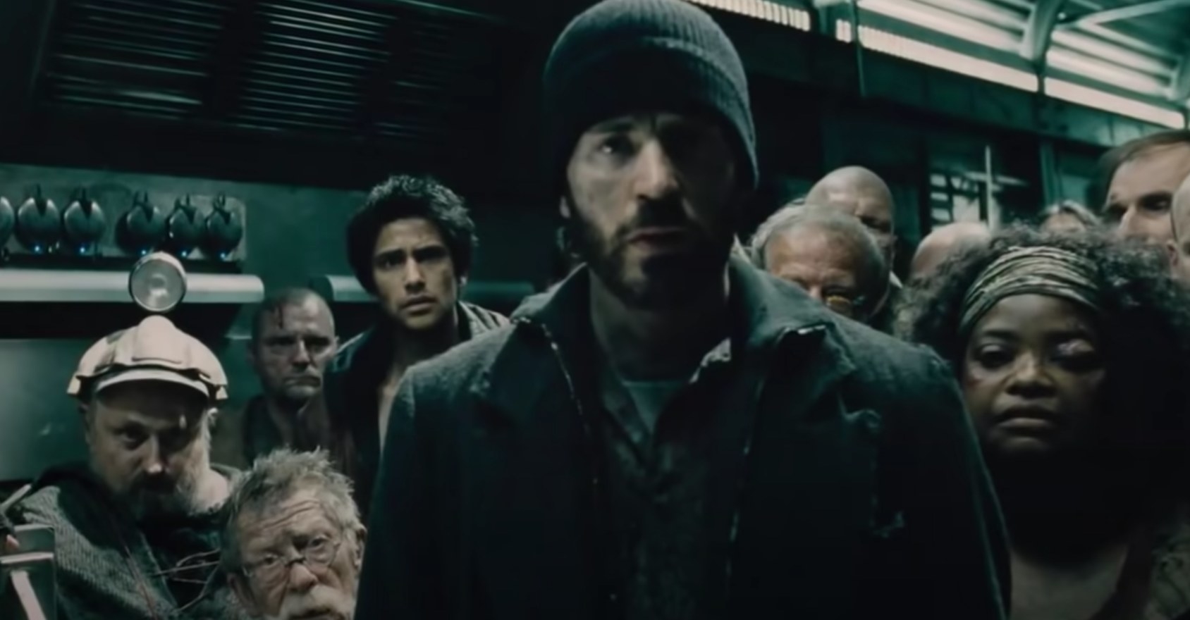 People squashed on the tail end of the train in Snowpiercer