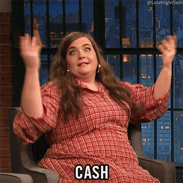 GIF of a woman throwing her hands up and saying &quot;cash&quot;
