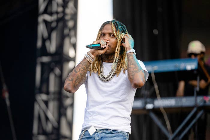 Lil durk on stage at Lollapalooza with a mic before the incident