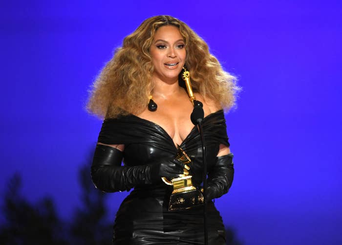 Beyoncé holding a Grammy