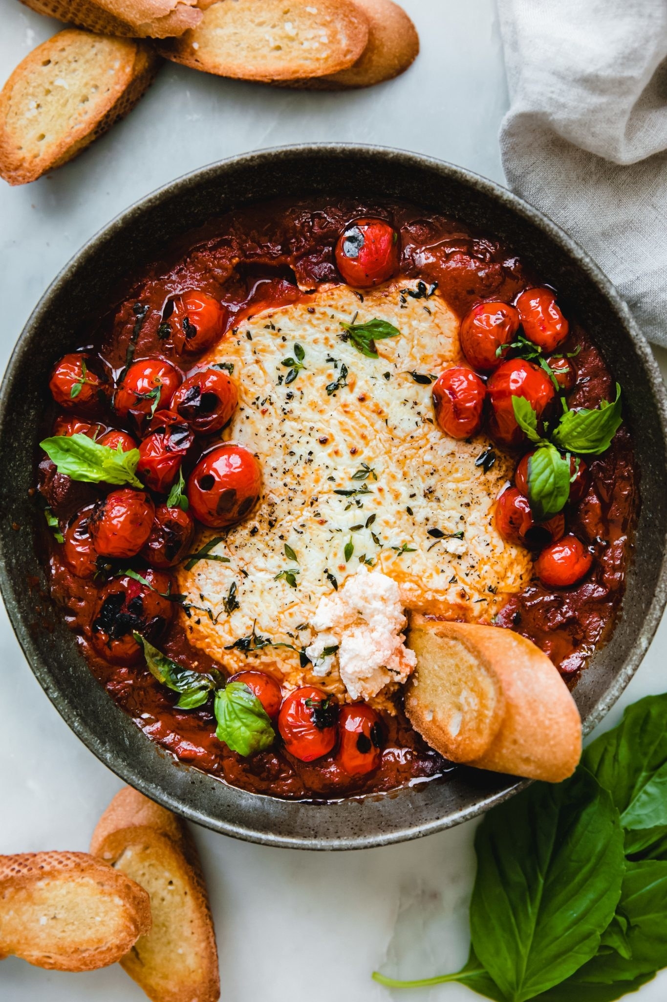 Jammy tomato dip with goat cheese and bread