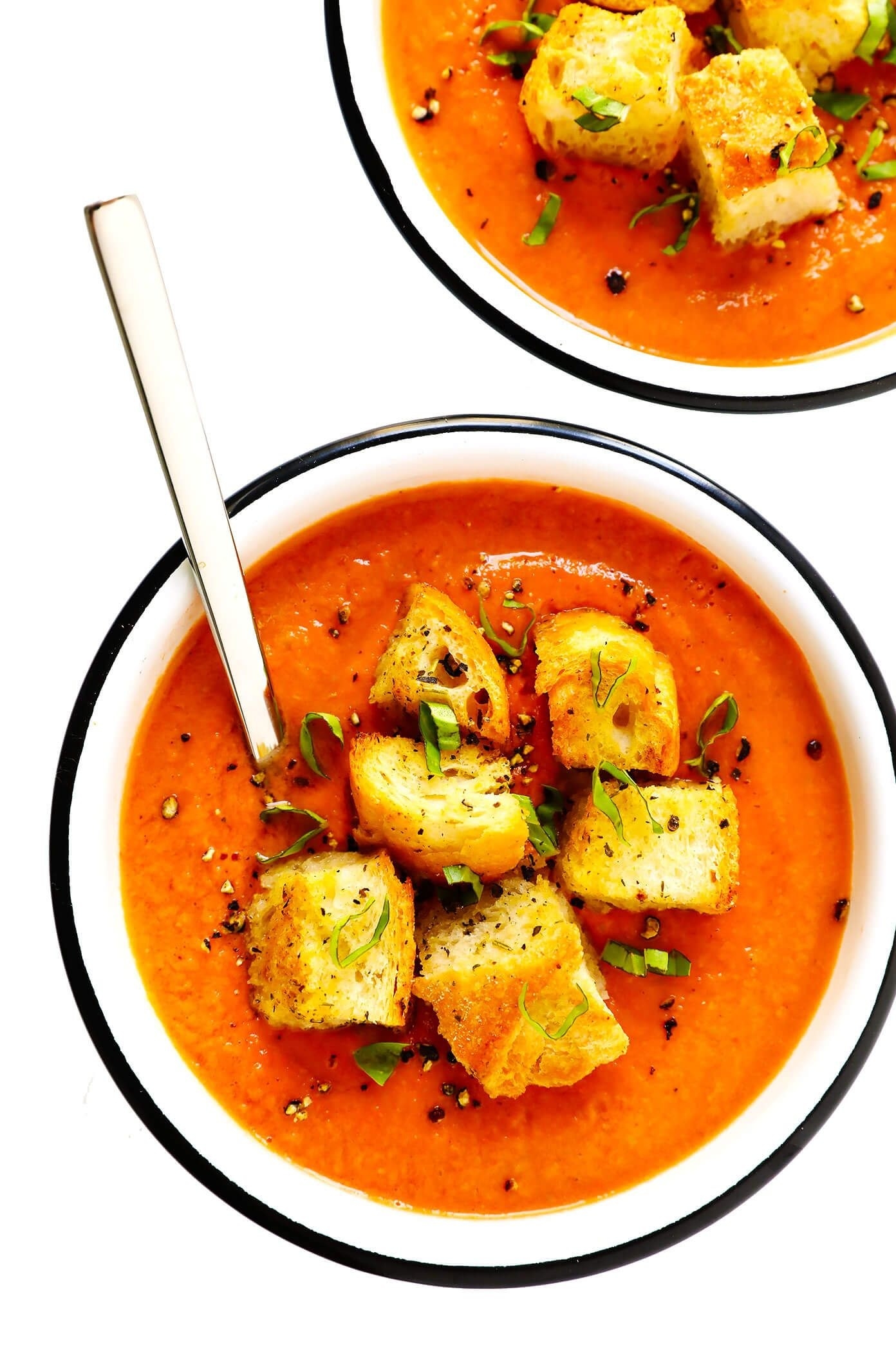 Bowls of gazpacho with croutons.
