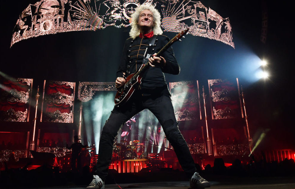 brian may on stage with guitar