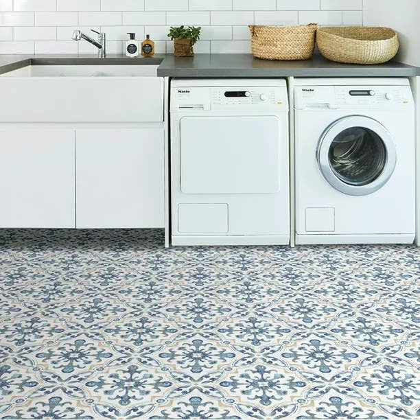 The blue patterned floor tiles
