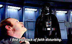 Darth Vader uses the Force to choke an Imperial officer