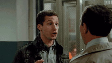 Charles Boyle and Jake Peralta do a synchronized dance