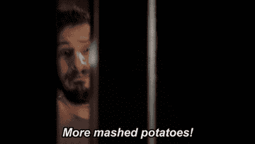 A close up of Jake Peralta screaming, &quot;More mashed potatoes&quot;