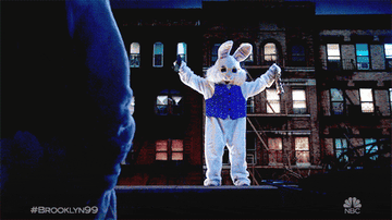 Someone in an Easter bunny costume jumps off the roof