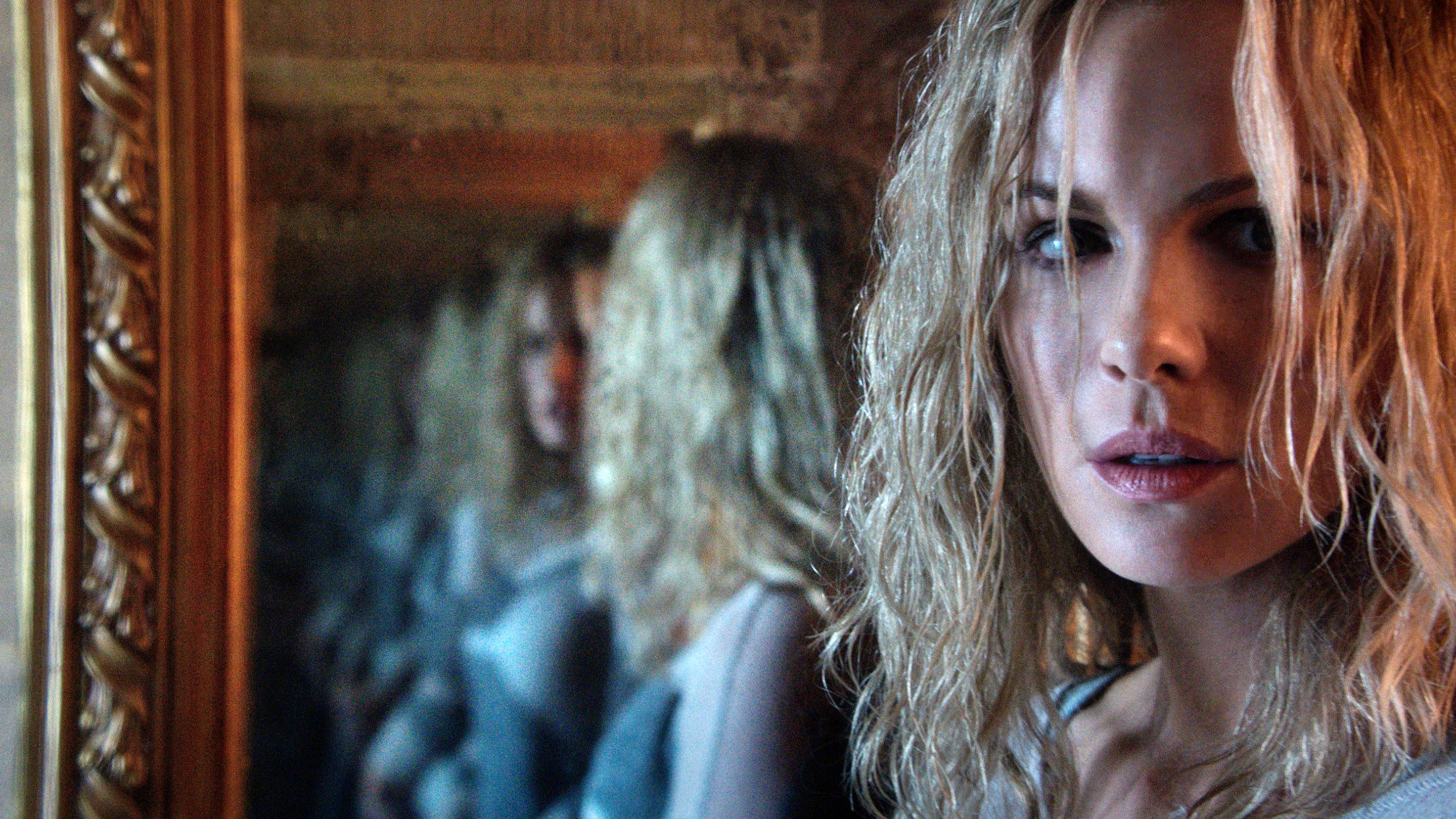 Kate Beckinsale shares a look of concern reflected in a nightmarish mirror in &quot;The Disappointments Room&quot;