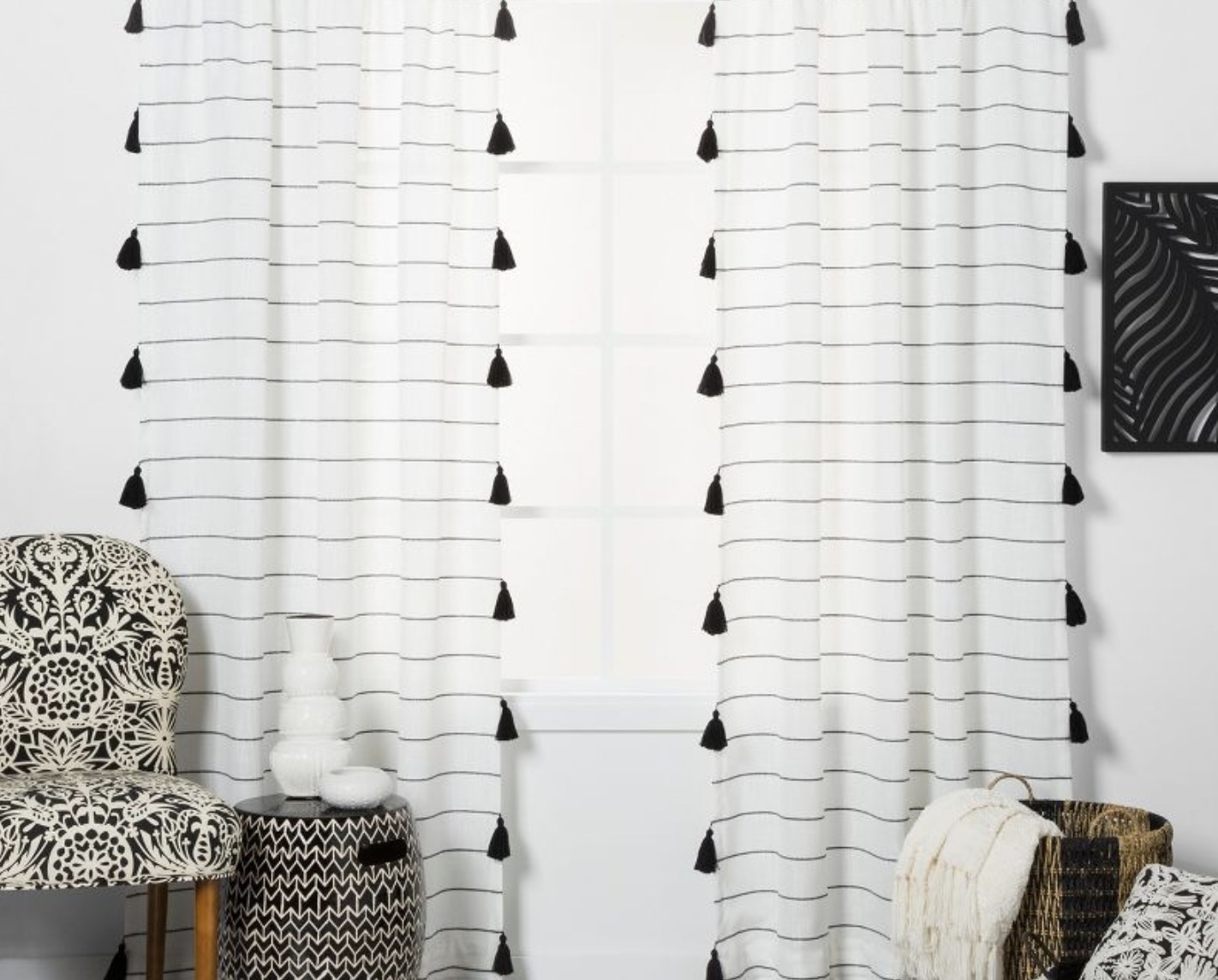 A set of black and white striped curtains